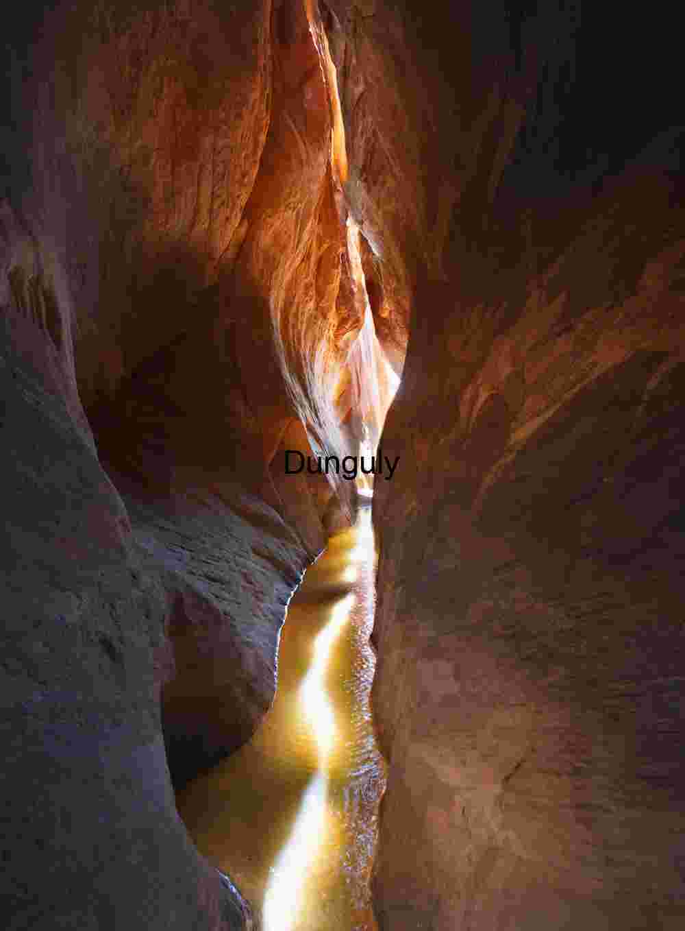 Tunnel slot at midday, near Summer solstice; Escalante, Grand Staircase N.M.