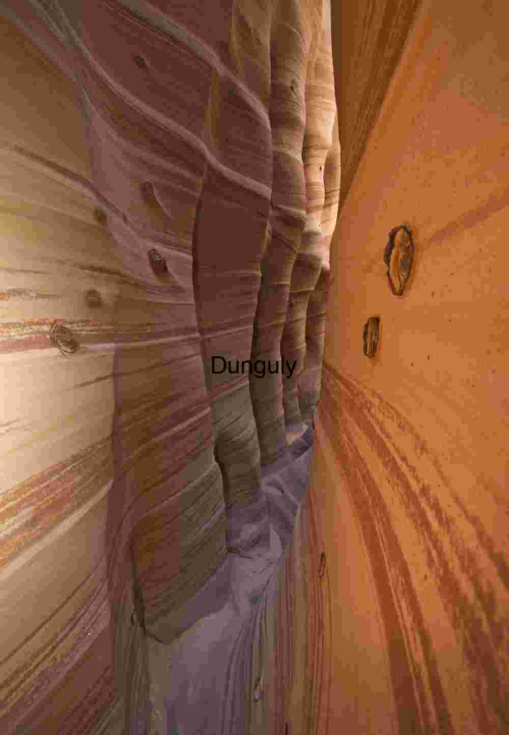 Zebra slot with Moqui marbles; Escalante, Grand Staircase N.M.