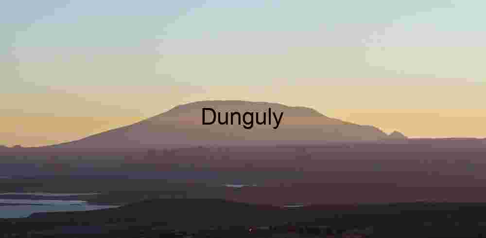 Navajo Mountain Smog Sunset: Layered Desert Twilight