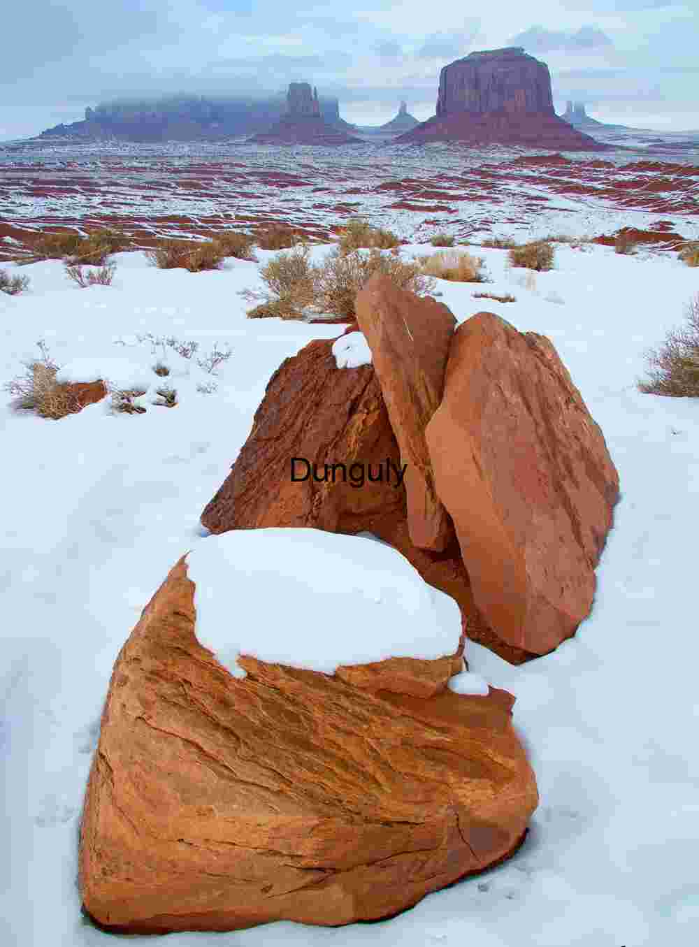 Winter | Monument Valley Buttes under Two Clouds: Desert Road Panorama
