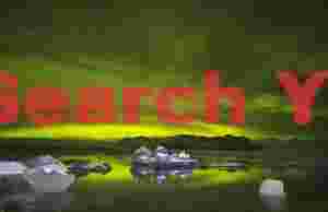 Aurora and Cloudbank Mirrored in Jökulsárlón Lagoon