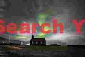 Aurora and moonlit clouds over Búðir church; Snaefellsnes peninsula