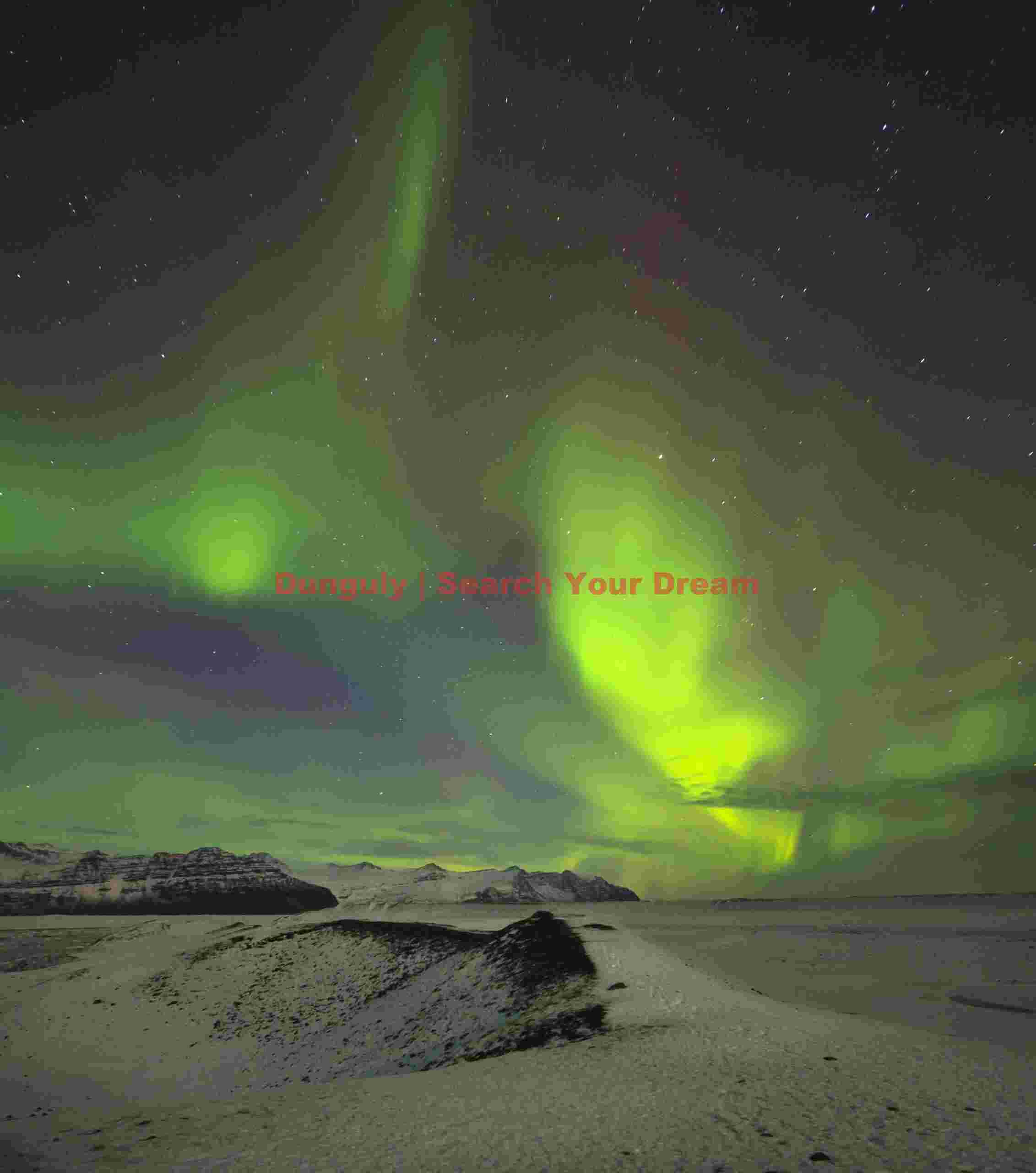 Aurora Illuminating Winter Snowscape at Jökulsárlón