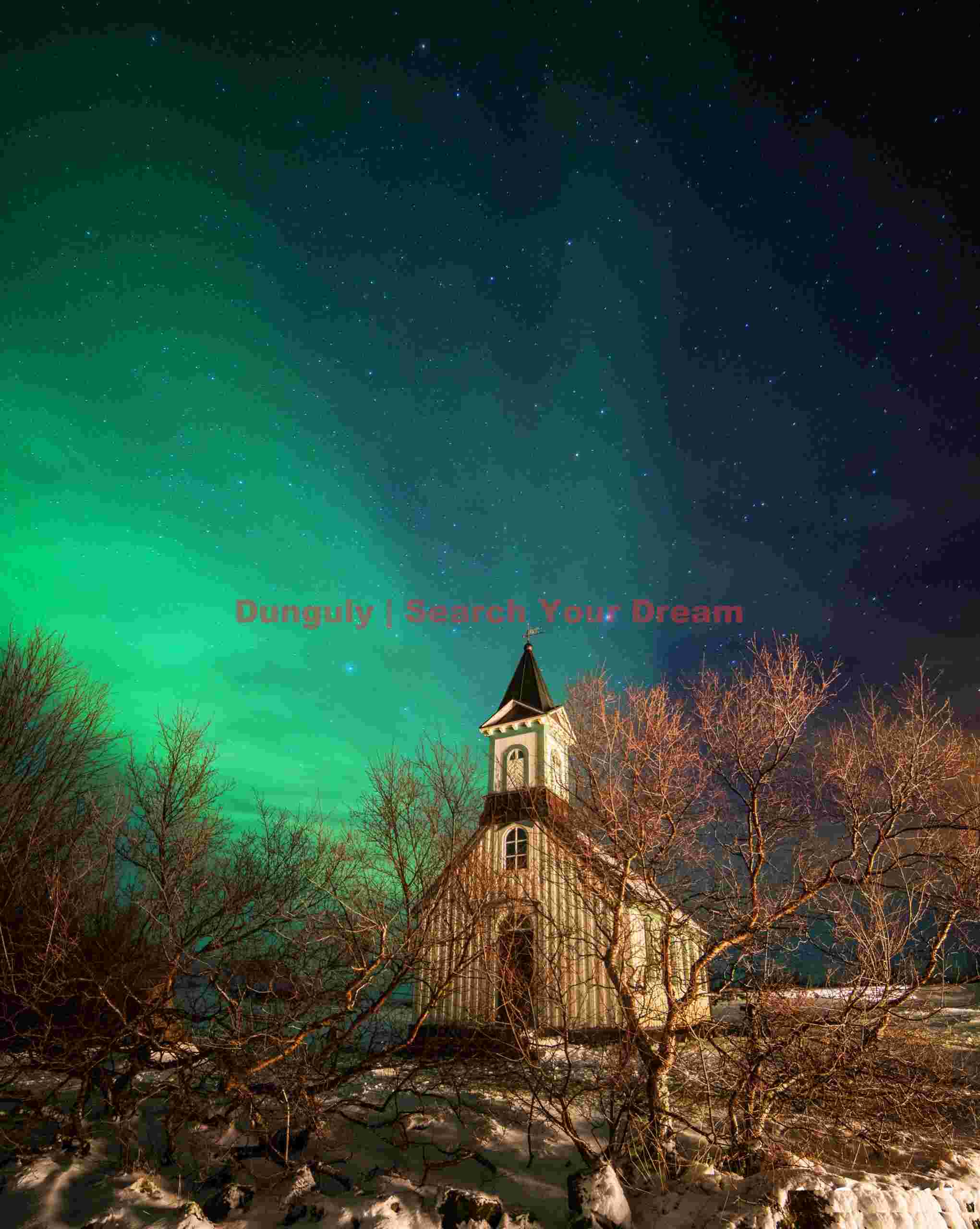 Aurora over trees and church; Þingvellir