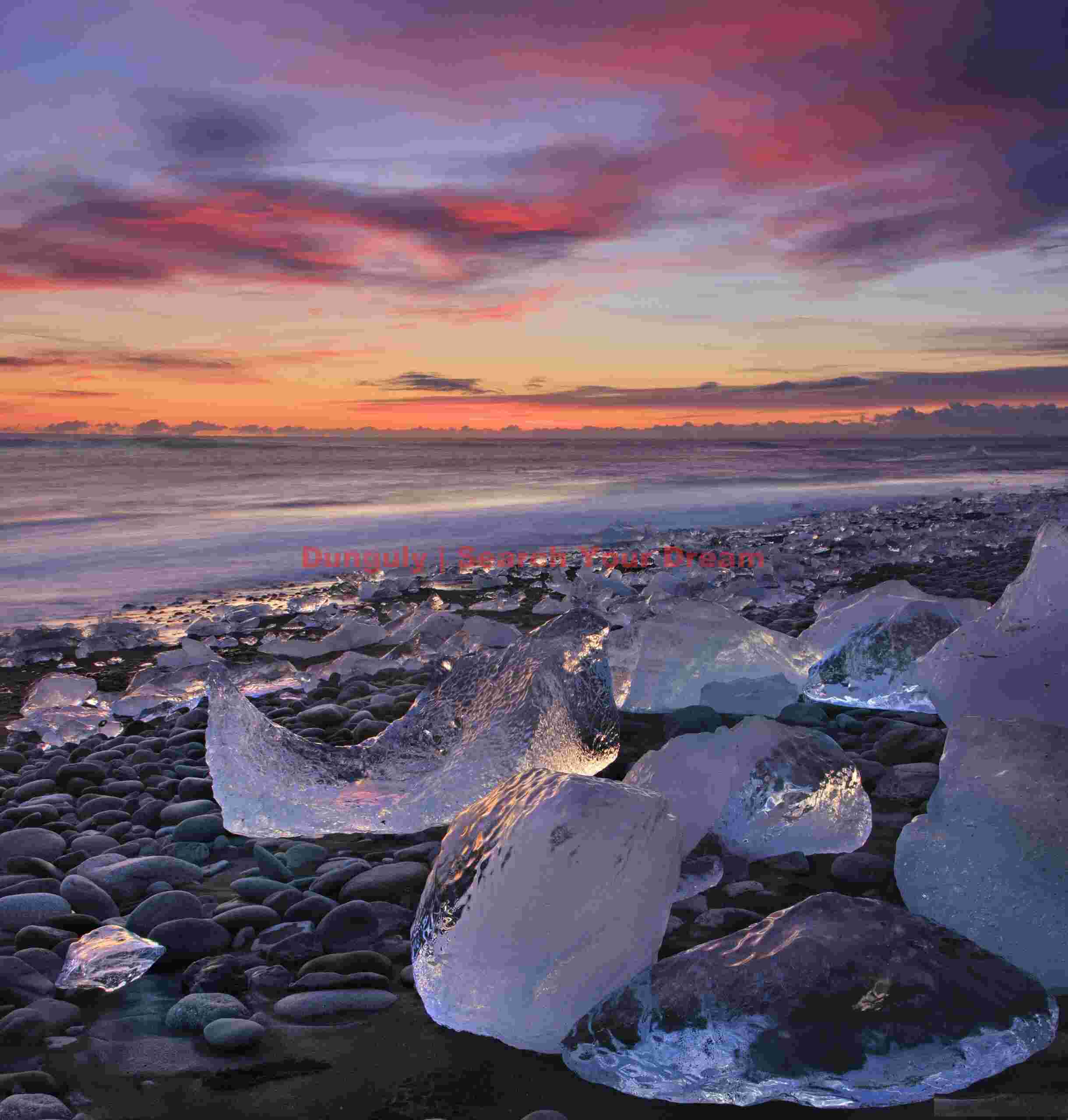 Glacial Ice Formation at Bergs reflecting sunset sky