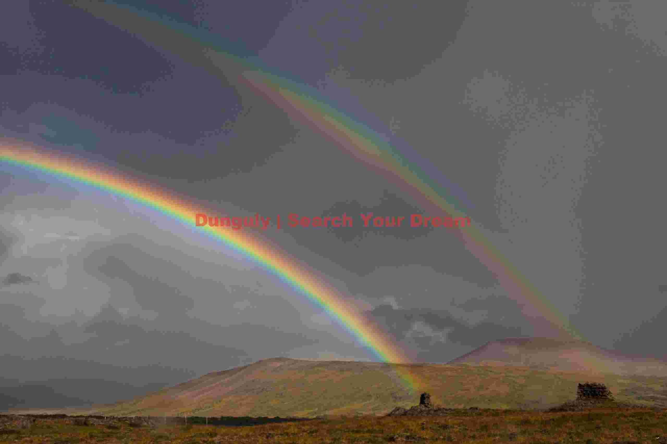 Cairns at the ends of a double rainbow