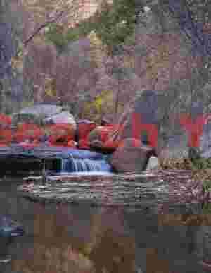 Mirror Pool Reflections in Slot Canyon