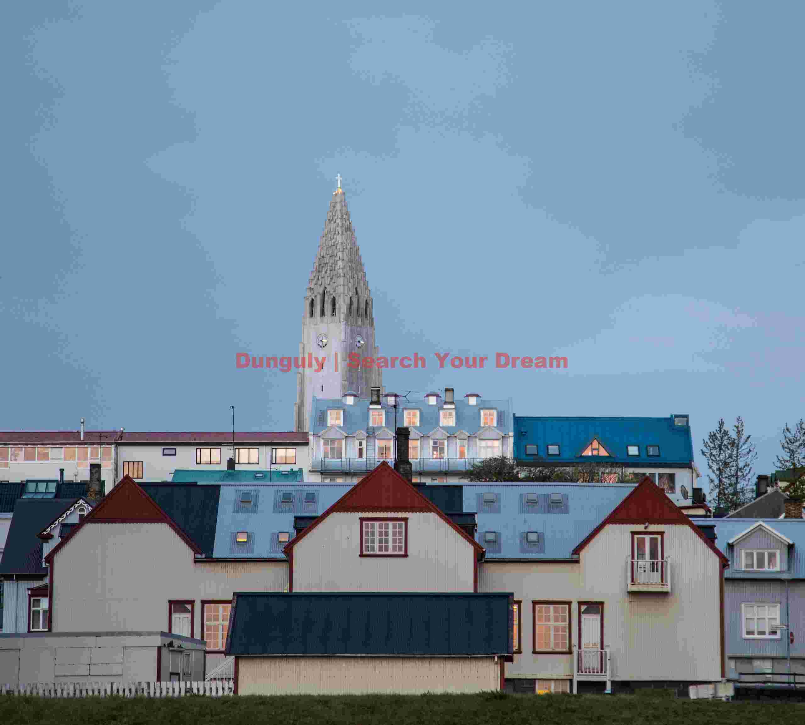 Catherdral and houses by early morning light; Reykjavík