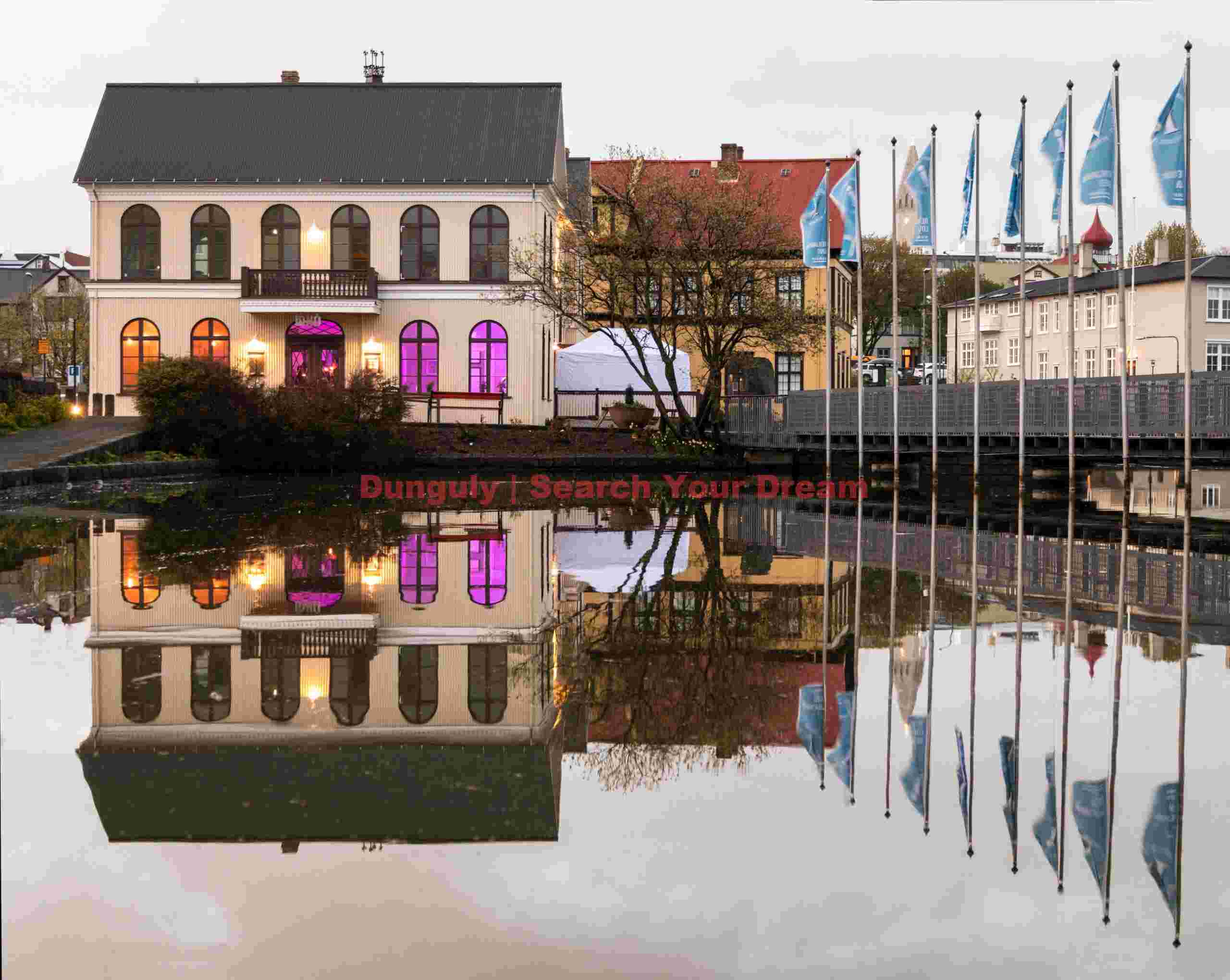 Colorful house and flagpoles, Reykjavík