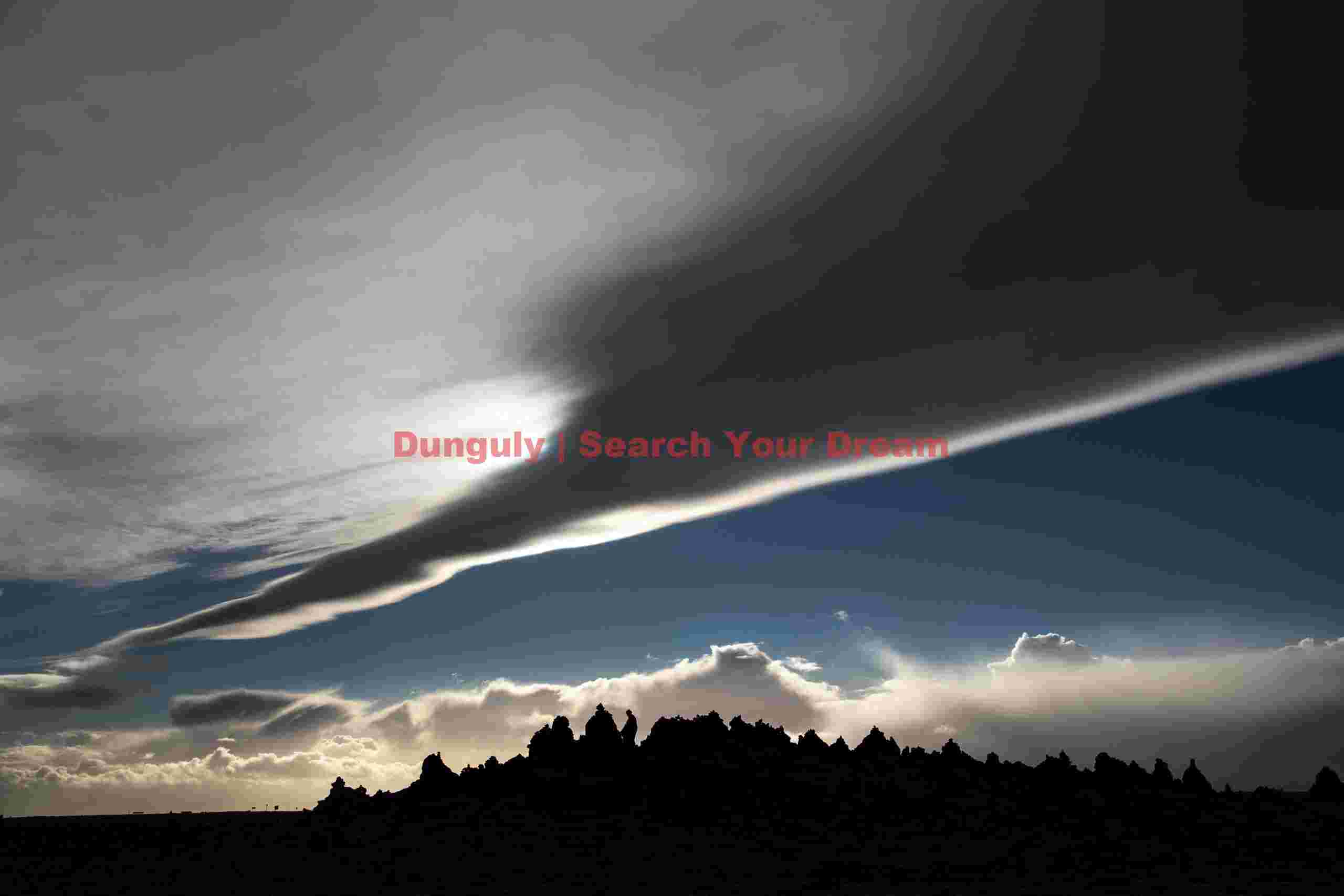 Glacial Ice Formation at Diagonal cloudscape over lava pinnacles