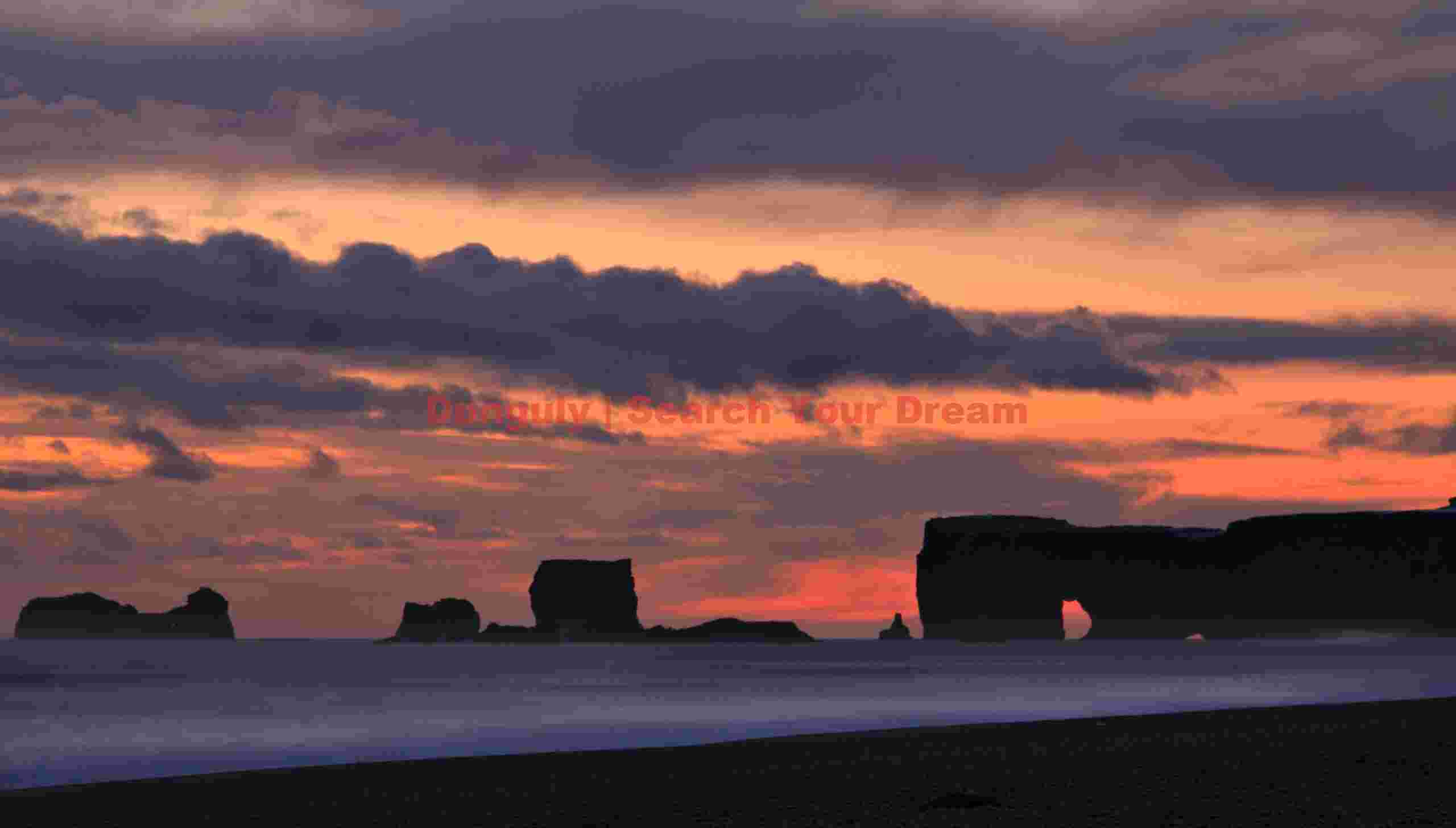 Dyrholaey arch, winter sunset