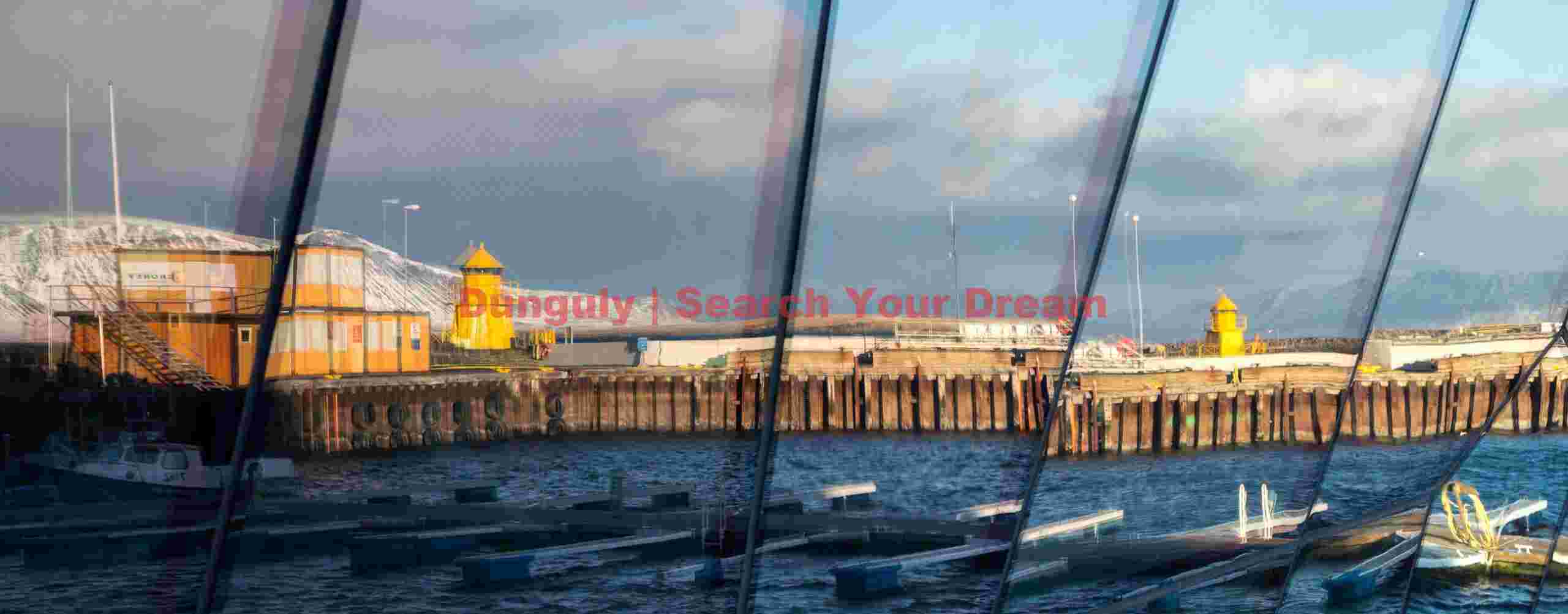 Harbour reflection in Harpa windows; Reykjavik