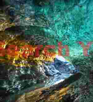 Glacial Ice Formation at Icelandic TV presenter in the Golden ice cave, Vatnajokull, Iceland