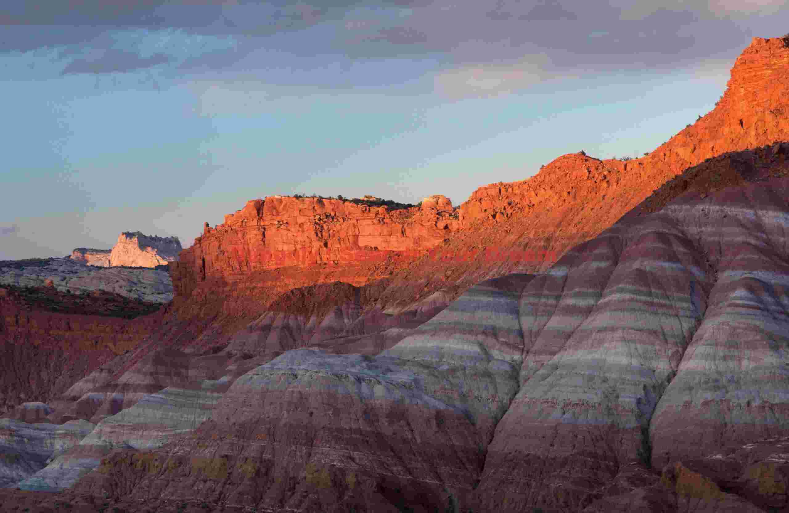 Golden Sunset Light Bathes Ancient Cliffs