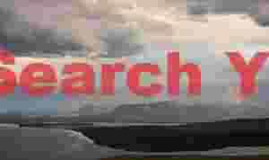 Partial rainbow and estuary, West Iceland