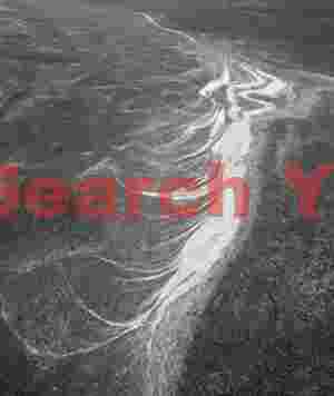 Glacial Ice Formation at Patterns in black sand