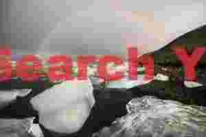 Rainbow over Jökulsárlón Lagoon;, South Iceland