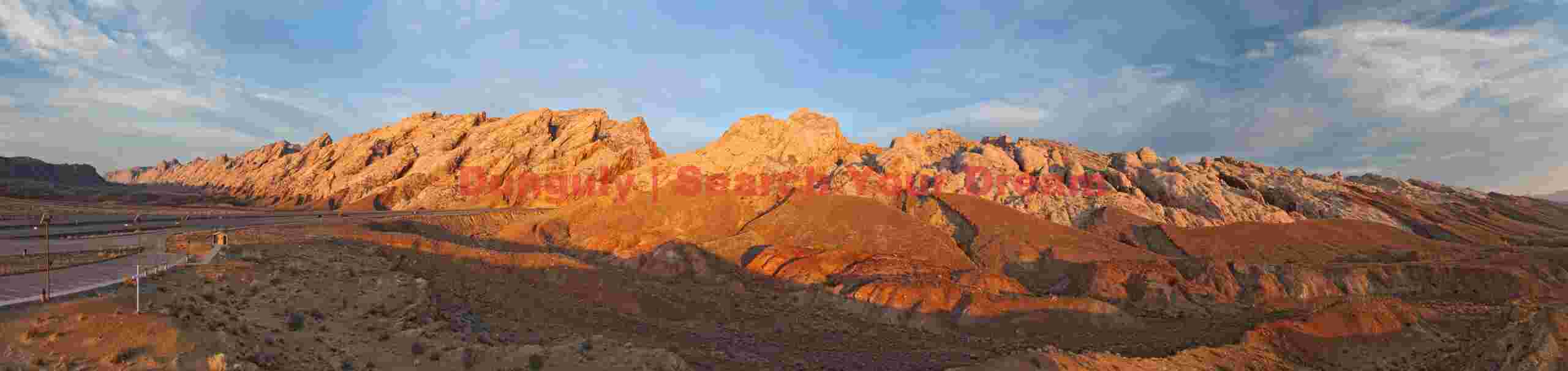 San Rafael Reef and Interstate 15 through Spotted Wolf Canyon - Sunrise