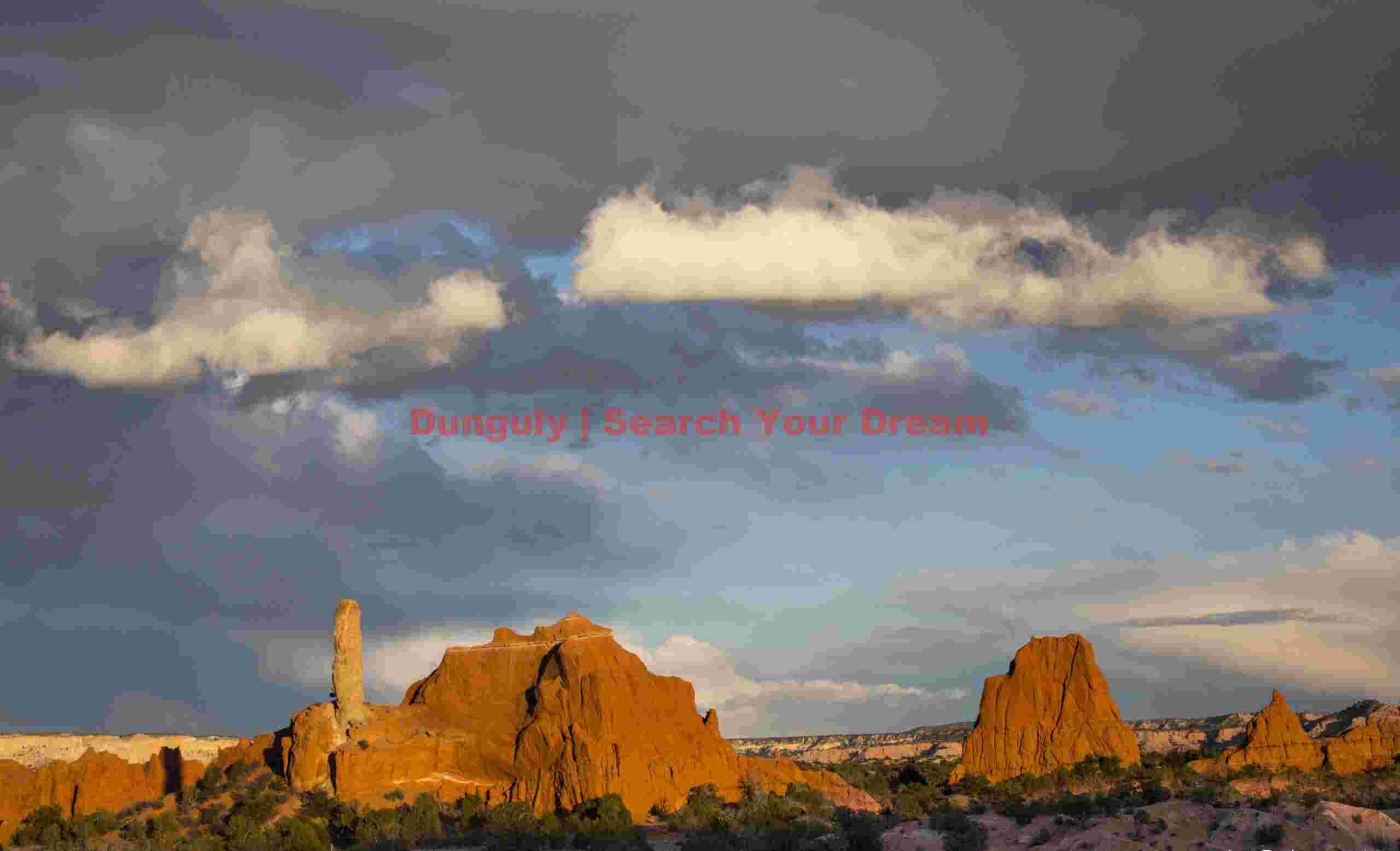 Sandstone Spire with Drifting Clouds - Kodachrome Basin