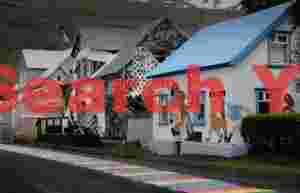 Seyðisfjörður houses and rainbow path; E. Iceland