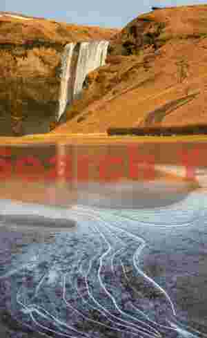 Skogafoss with leading ice lines; South Iceland