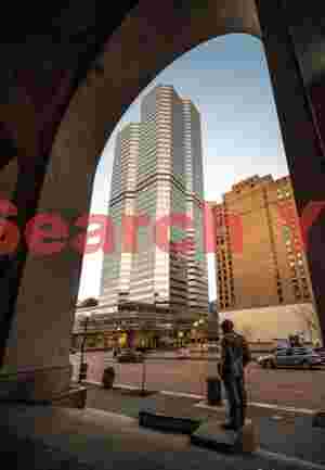 Statue and Skyscraper Through Arch in Pittsburgh
