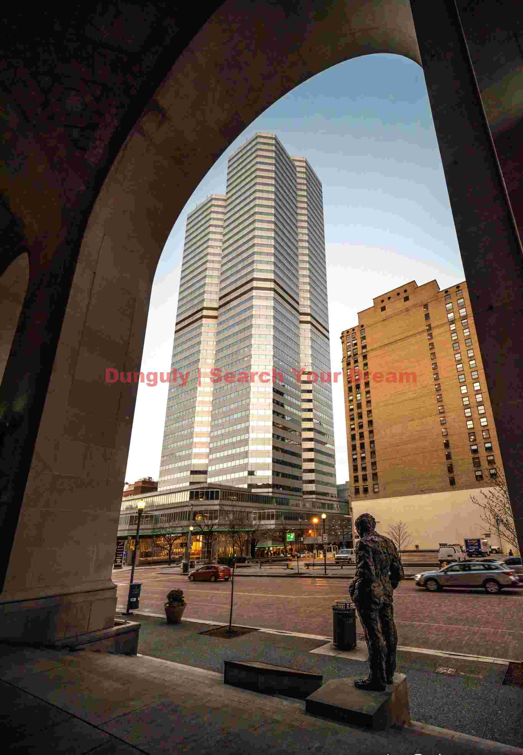 Statue and Skyscraper Through Arch in Pittsburgh