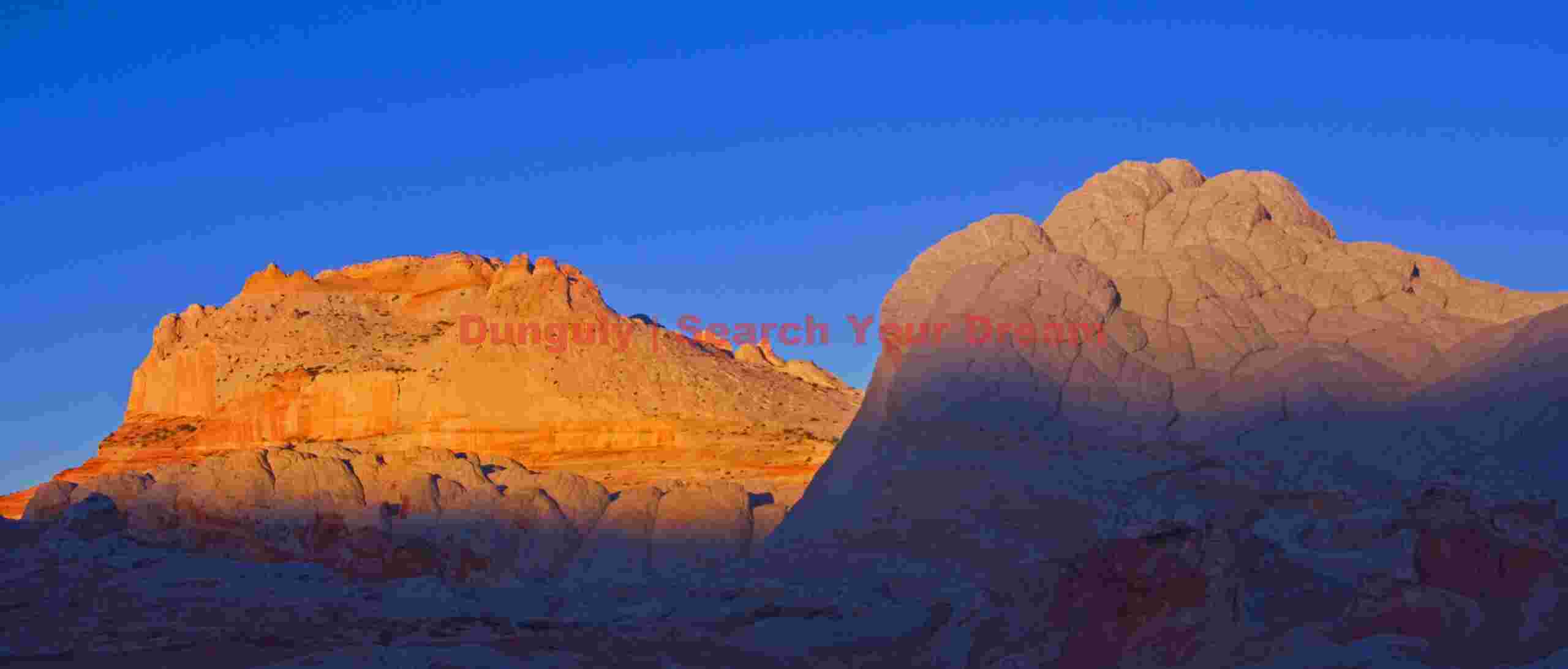 Sunrise on White Pocker butte and brain rock