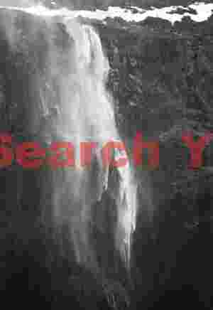 Vanishing waterfall converted to spray by gale-force winde; South Iceland