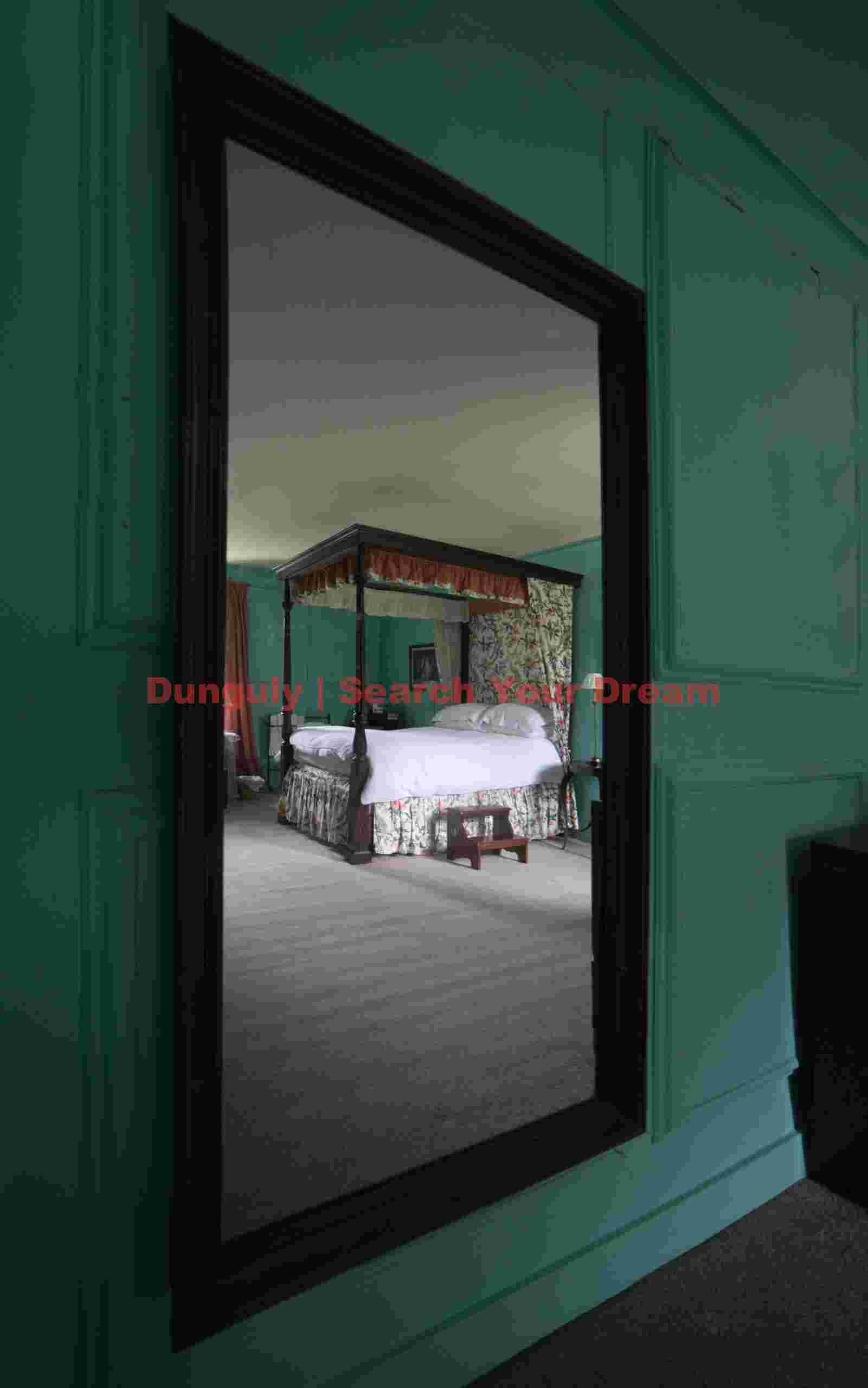 Bed reflection on mirror