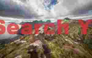 Cameron on top of the mountain above Tind