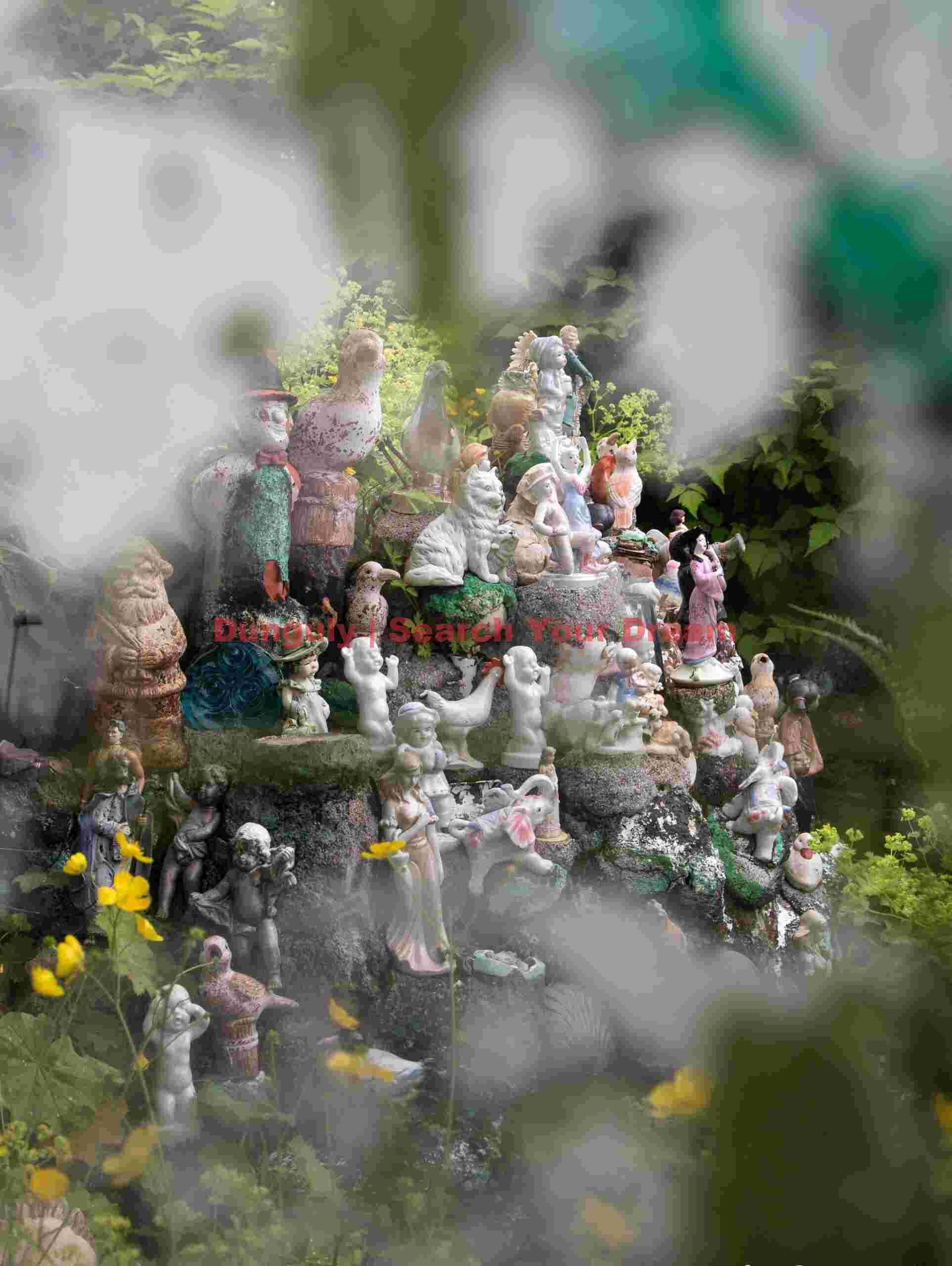 Cottage garden overrun with nick nacks #1