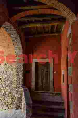 Doorway under red arches