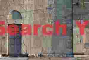 Duomo doorway illuminated by slanting sunrays