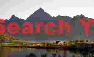 House highlighted by smoke