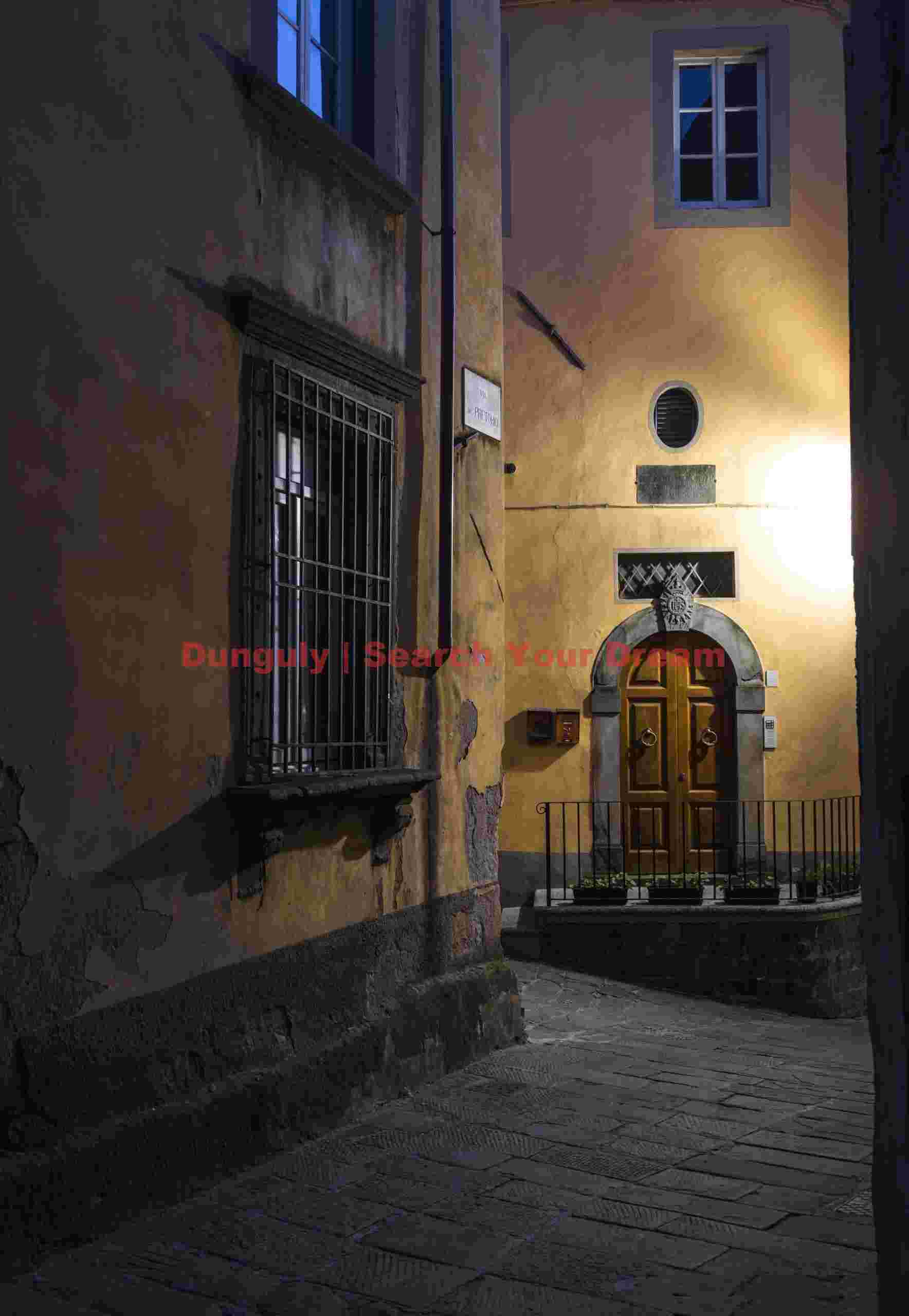 Illuminated doorway, Barga, Tuscany