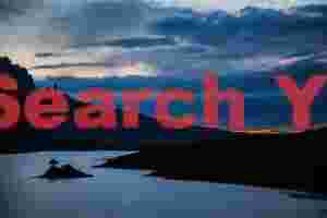 Old Man of Storr and island in Loch Leathan