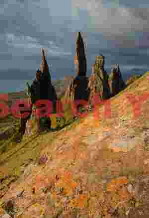 Old Man of Storr with ochre lichenous rock