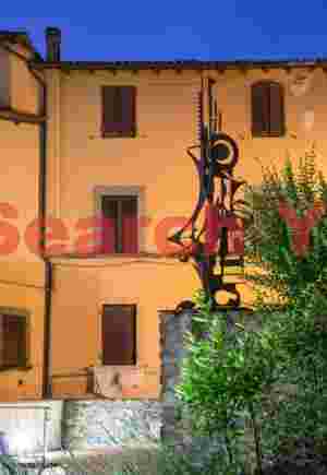 Sculpture and orange wall