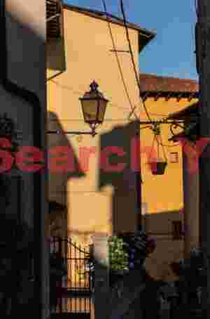 Streetlamp illuminated by sunray