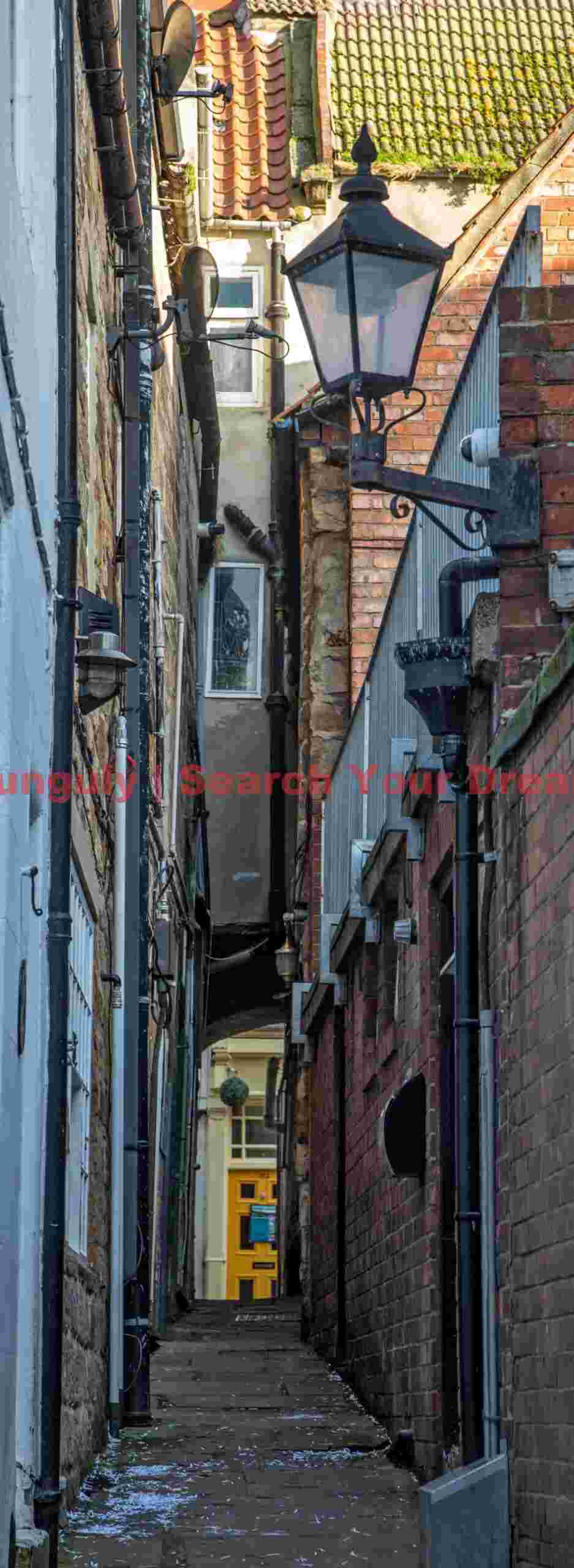 Street lamp in narrow alley