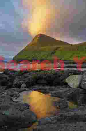 Sunrise cloud reflected in tidepool