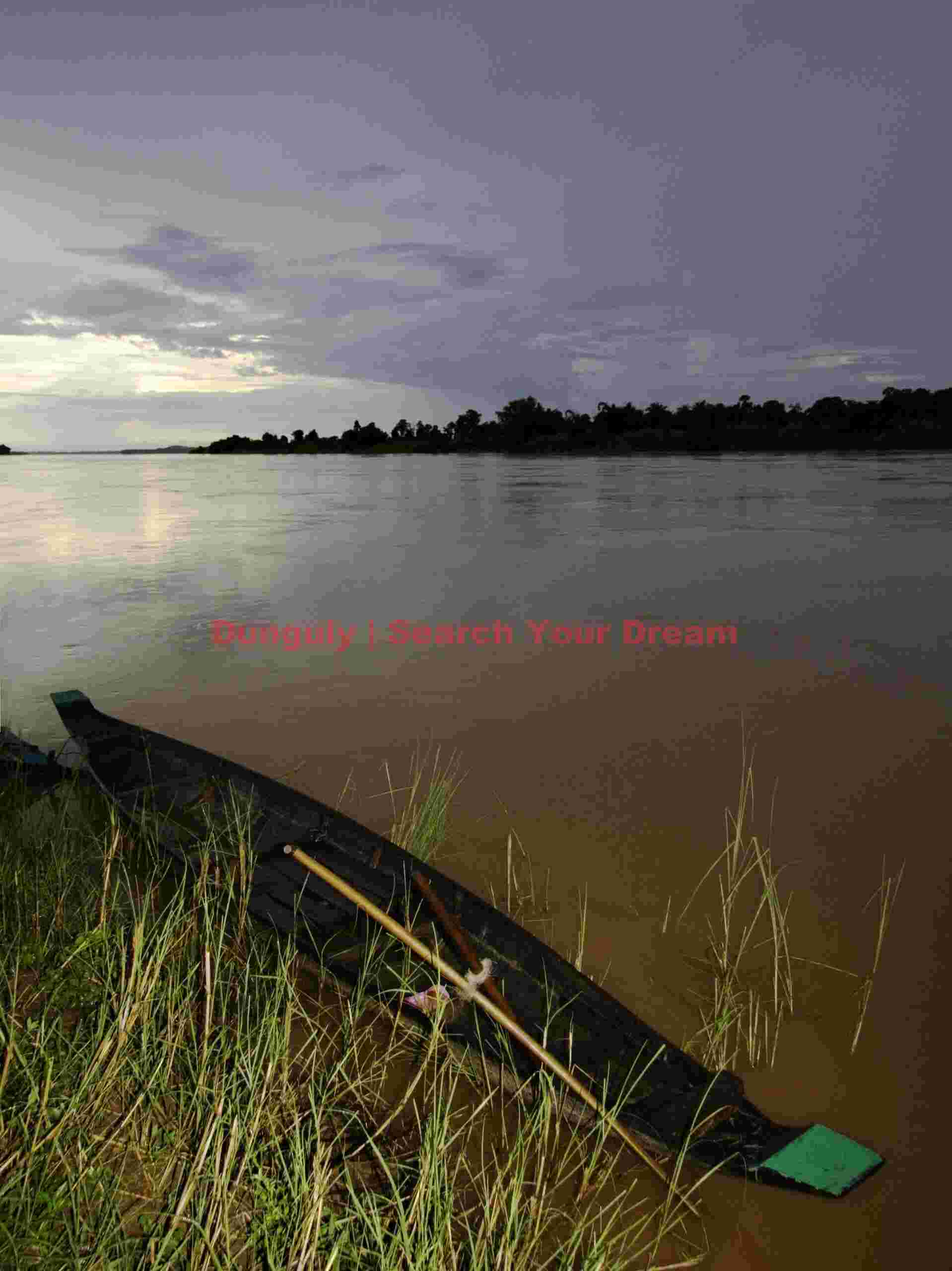 Boat at twilight , Mekong River, Laos
