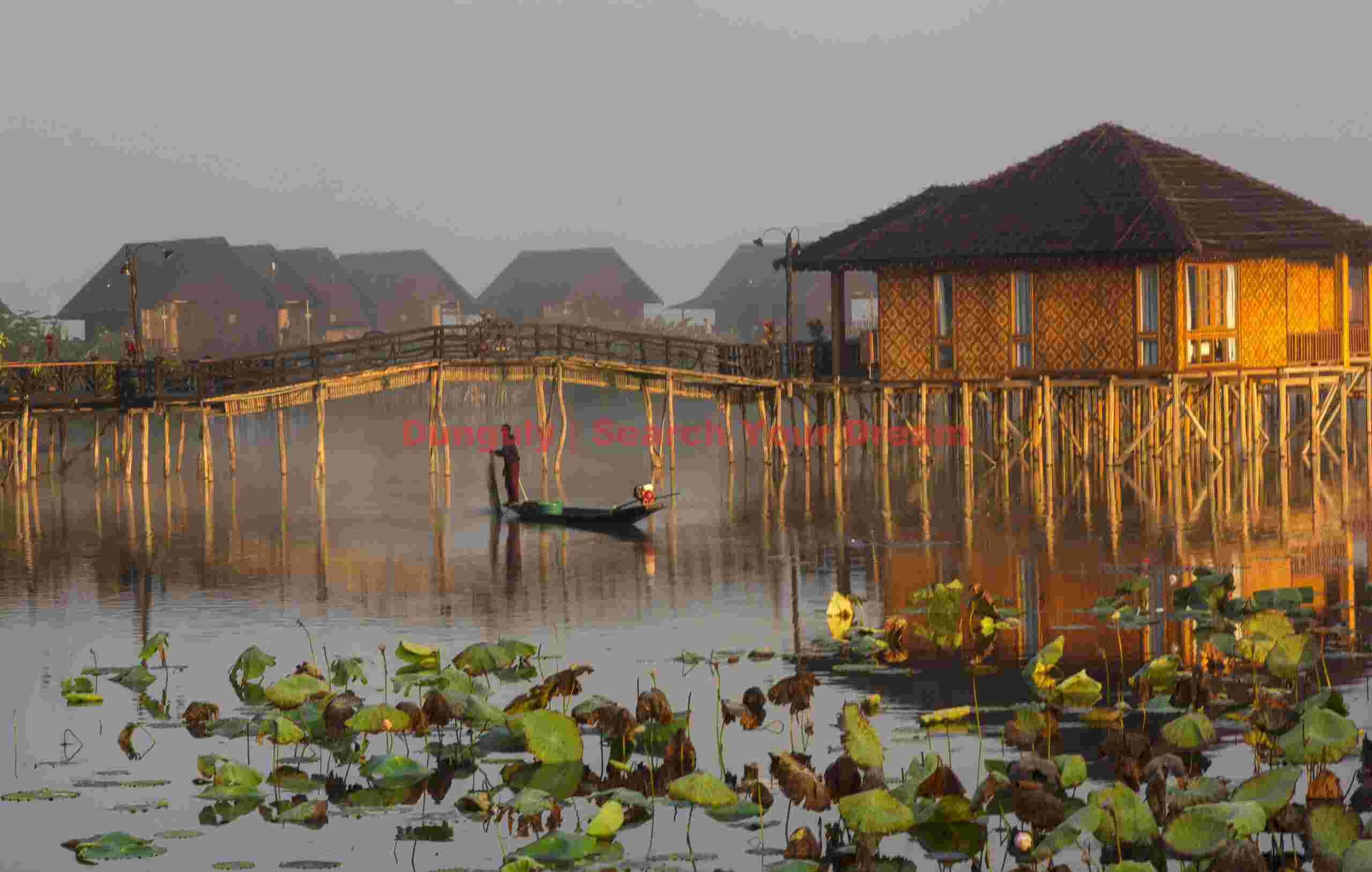 Bridge and fisherman at Golden Isles