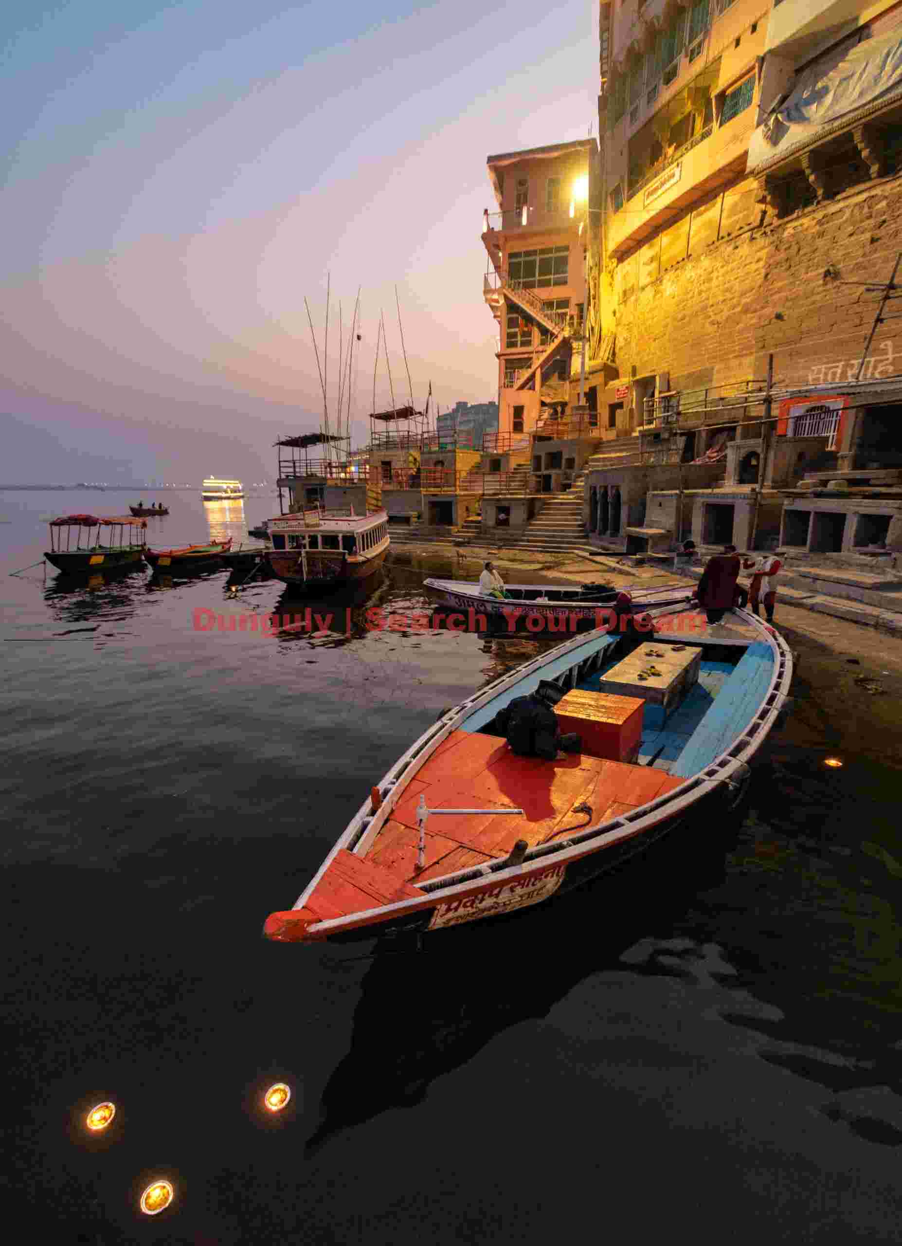 Butterlamps, red and blue boat