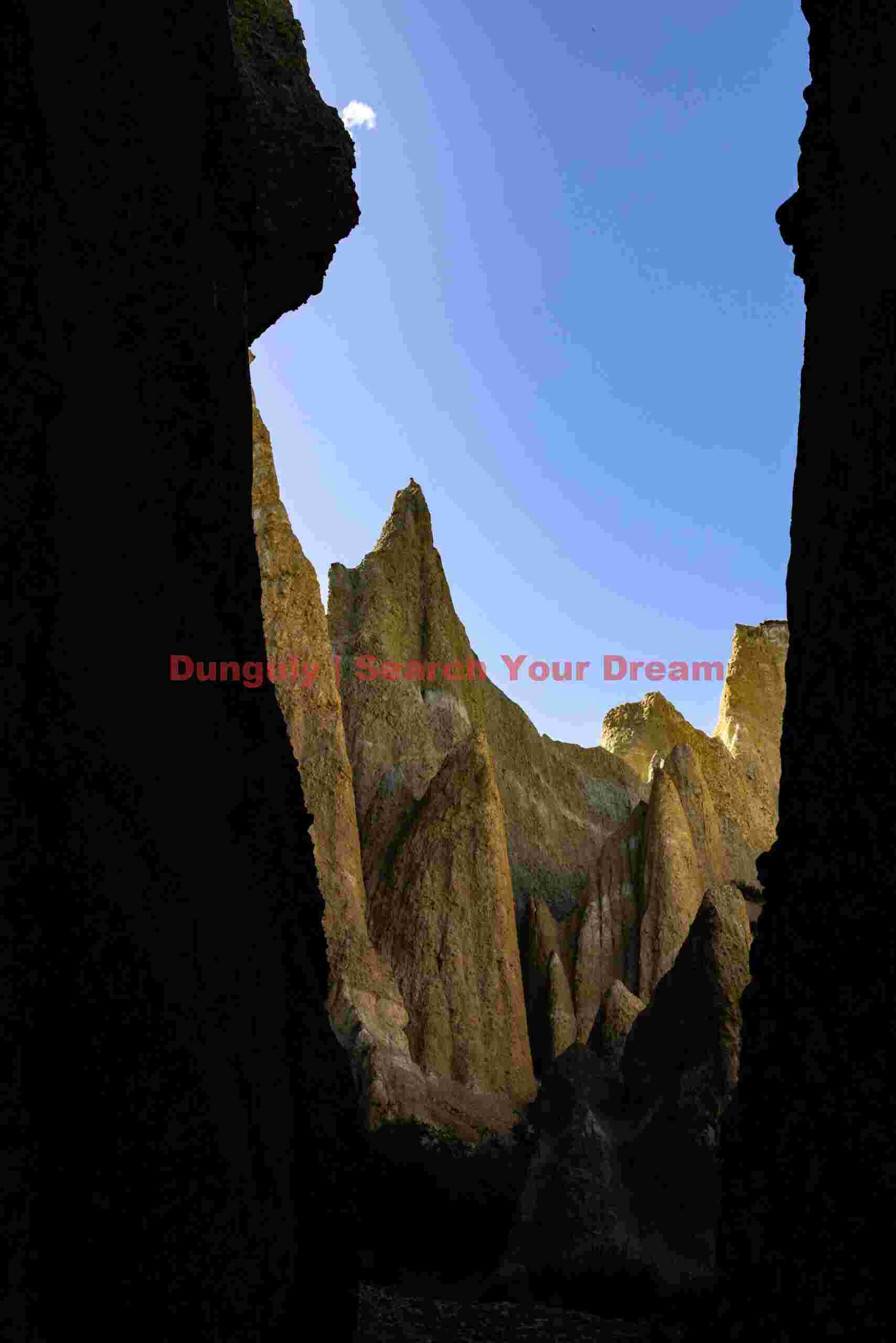 Clay cliffs of Omarama through a cleft