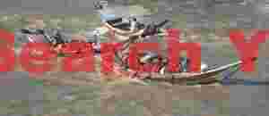 Ferry boats fighting strong current