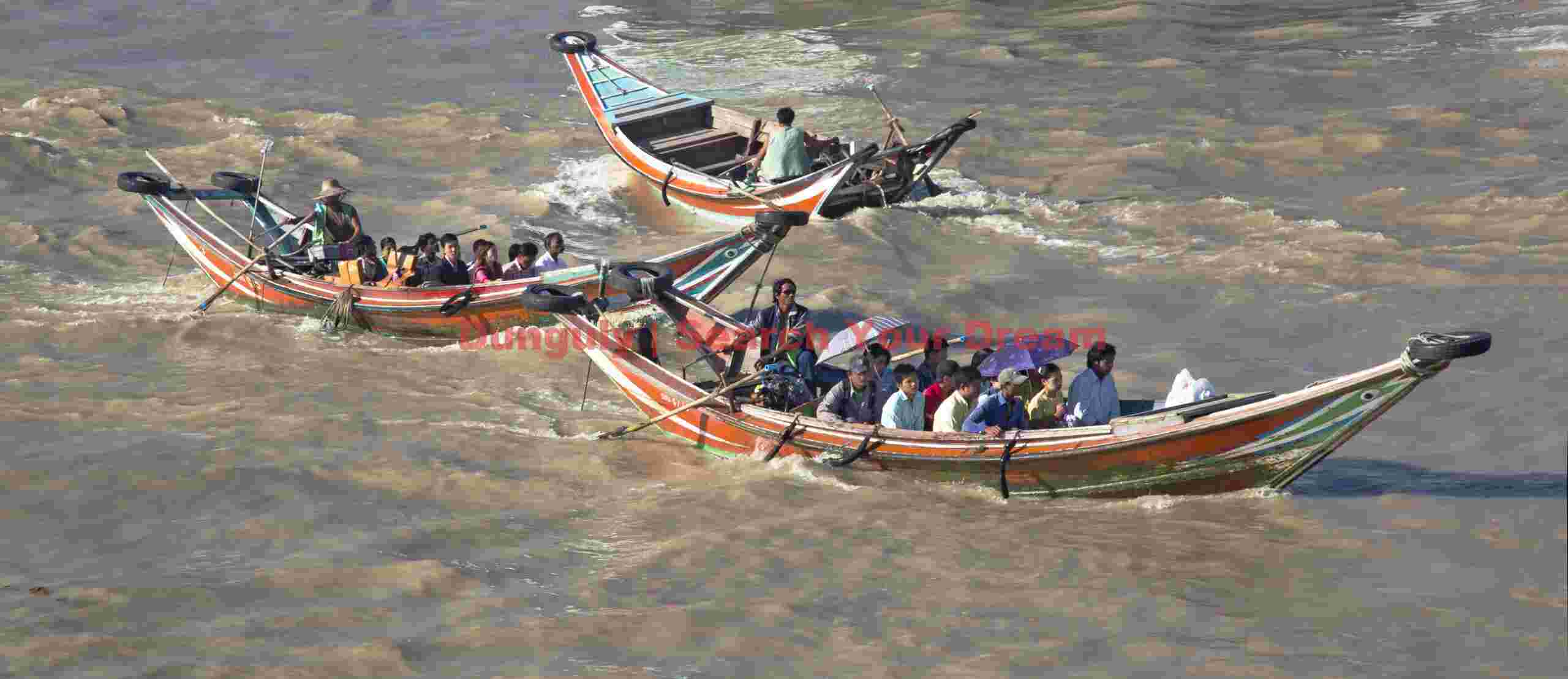 Ferry boats fighting strong current