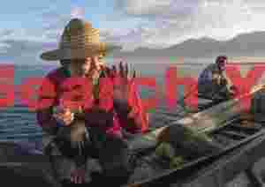 Fisherman happy at receiving a good tip!