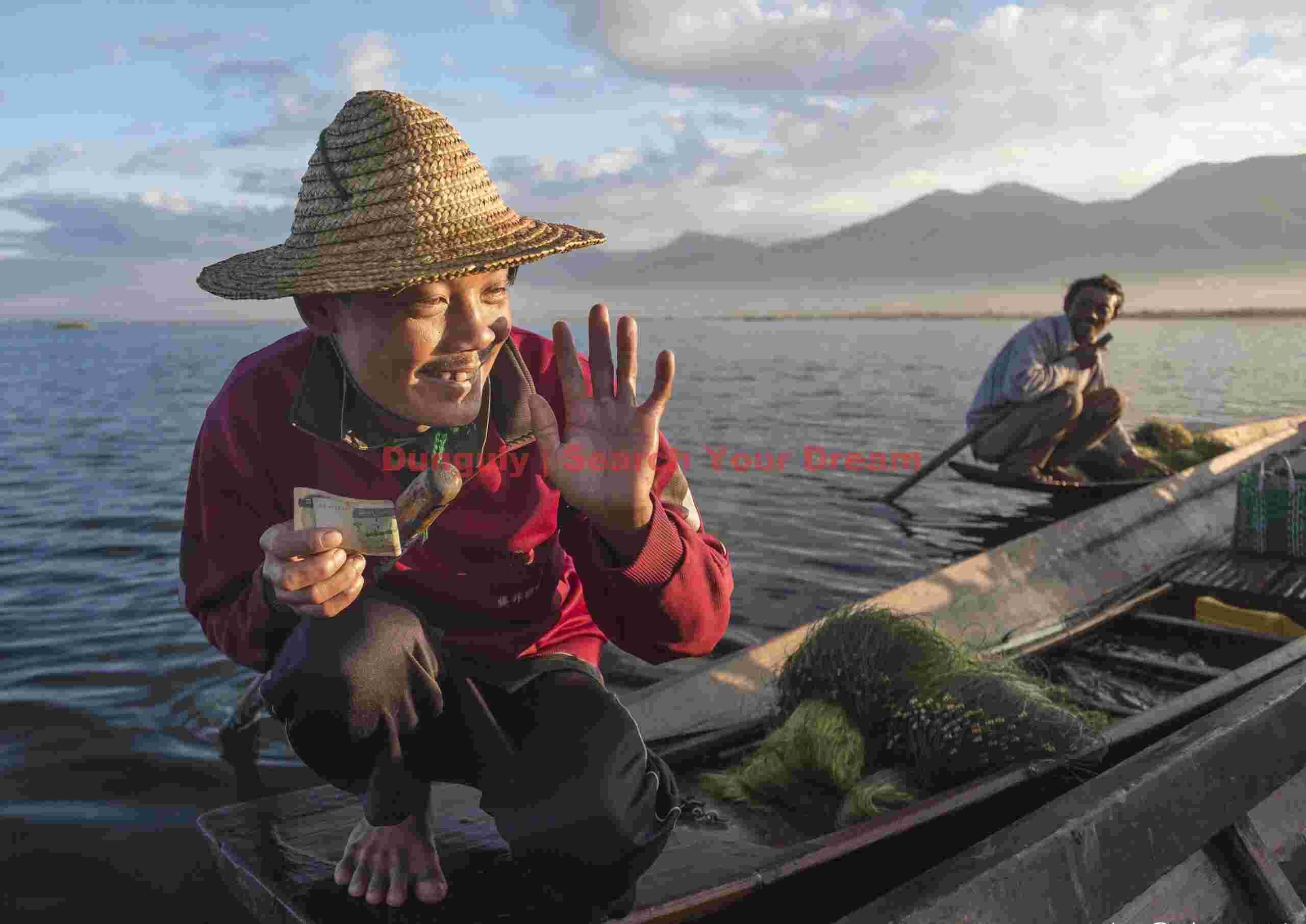 Fisherman happy at receiving a good tip!